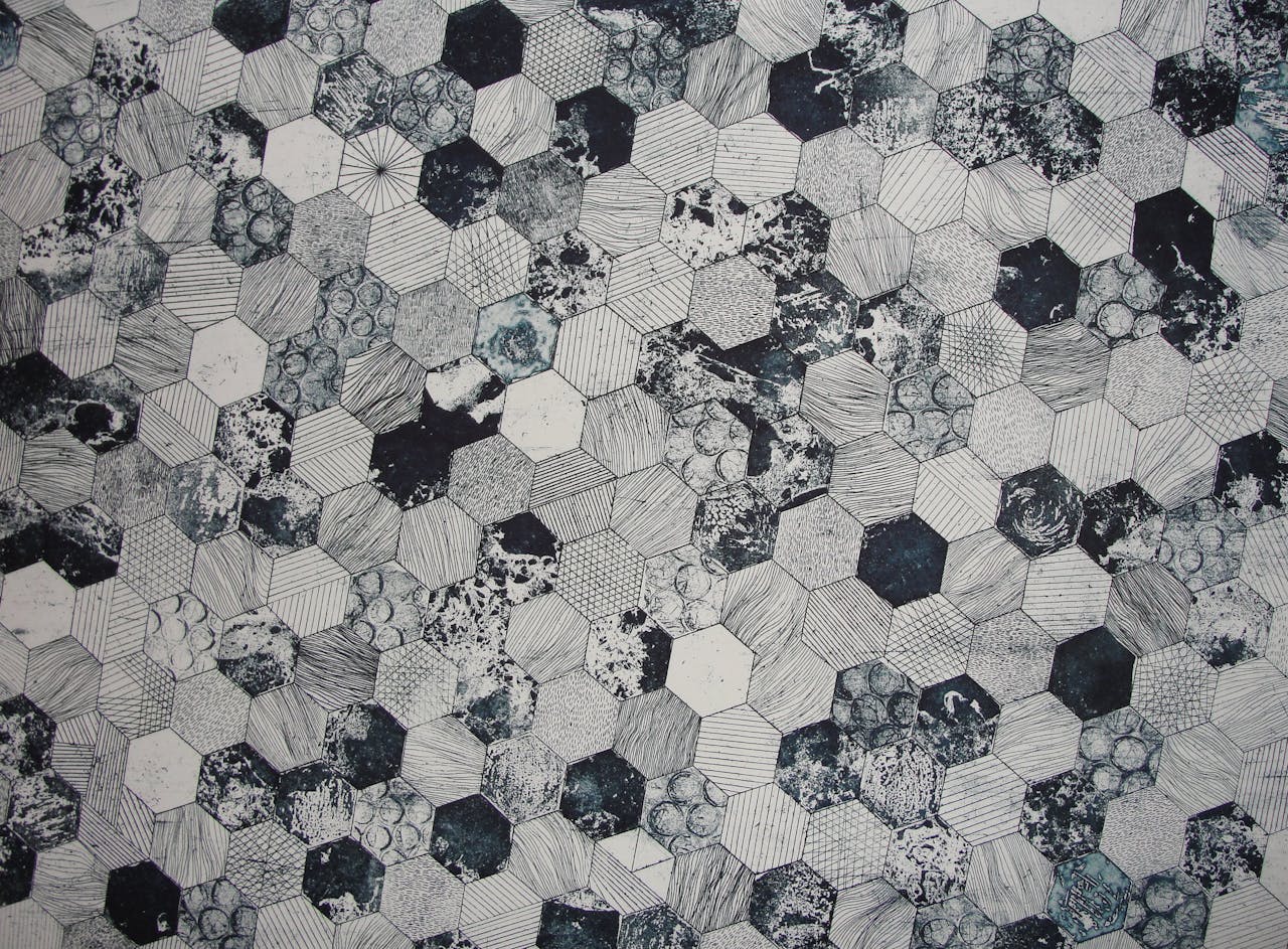 Home Abstract black and white hexagonal pattern with textured and geometric designs, ideal for backgrounds.